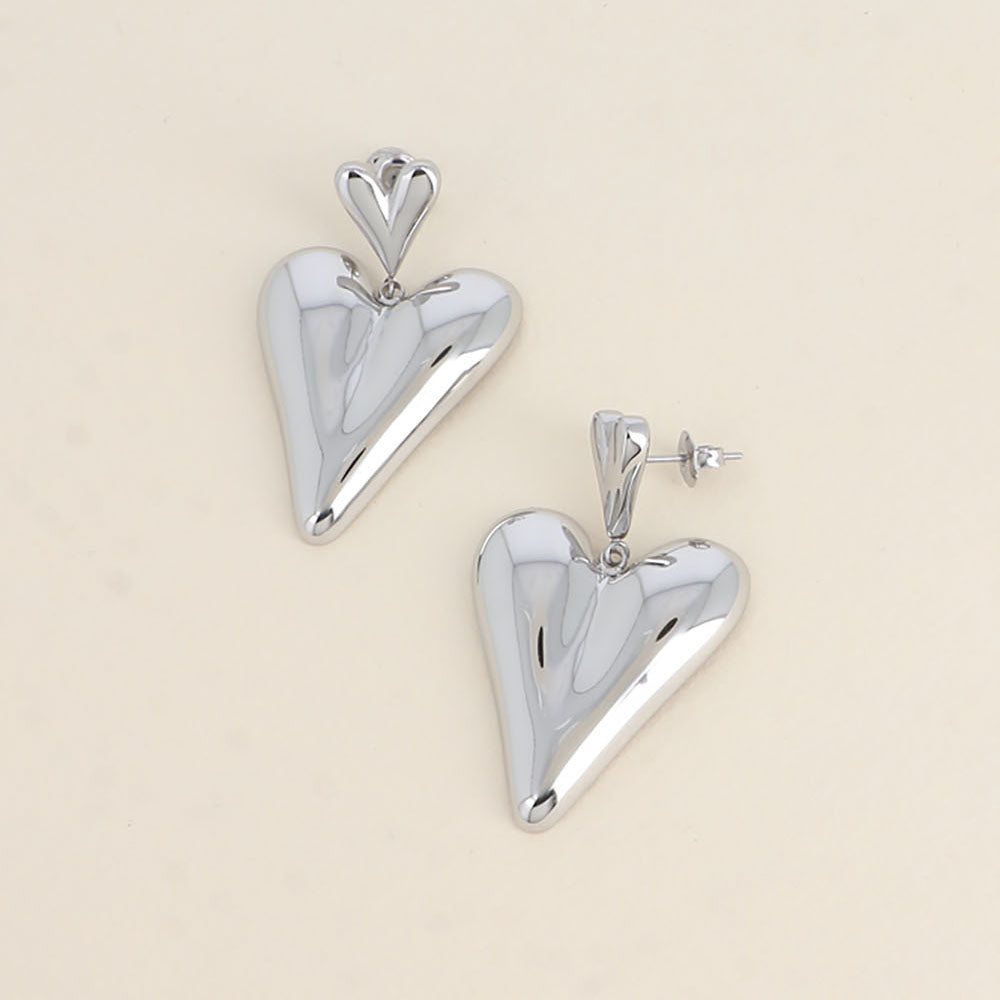 BOUCLES PENDANTES - 2 COEURS / DORE OU ARGENT