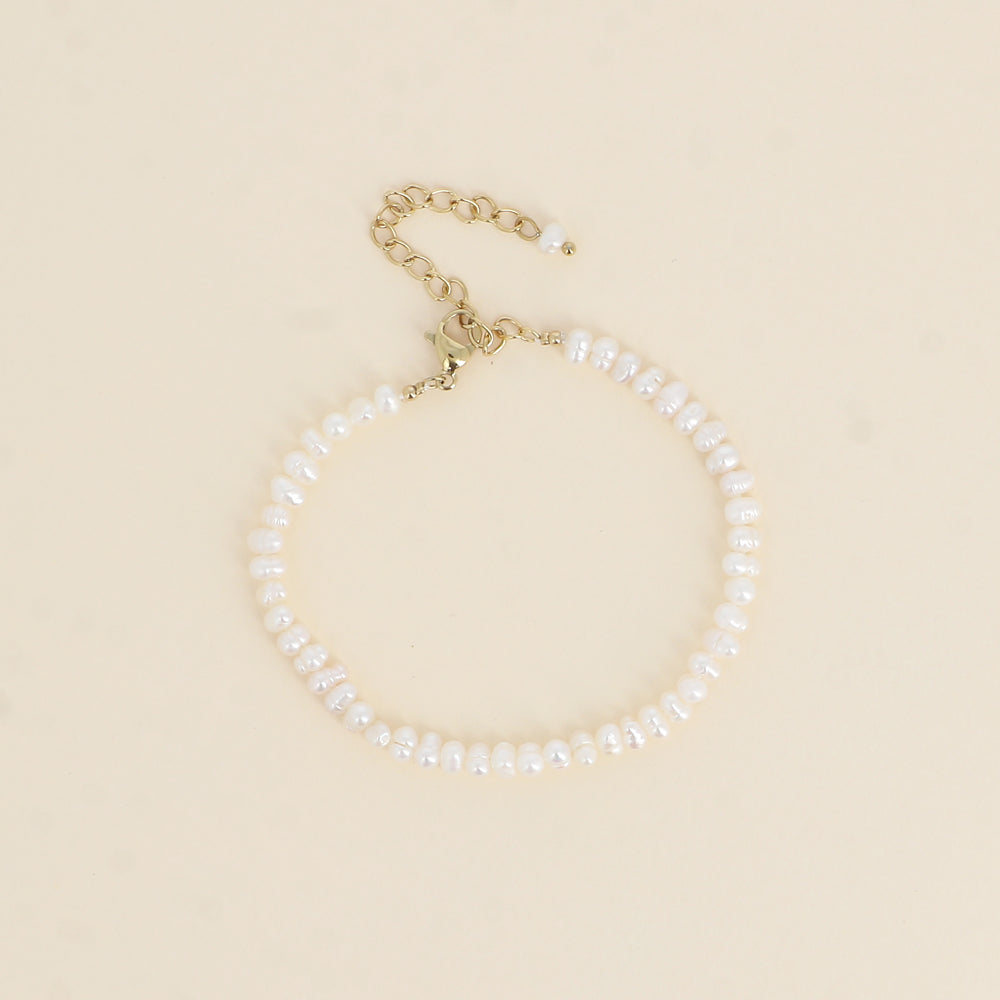 BRACELET SUR CORDON - PERLES D'EAU DOUCE