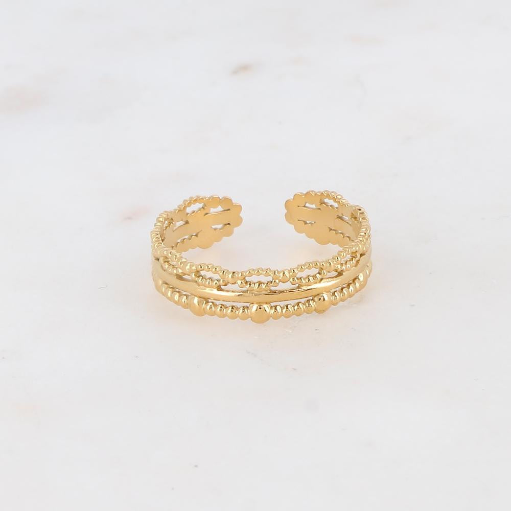 BAGUE AVEC MOTIFS GRAPHIQUES / DORE OU ARGENT