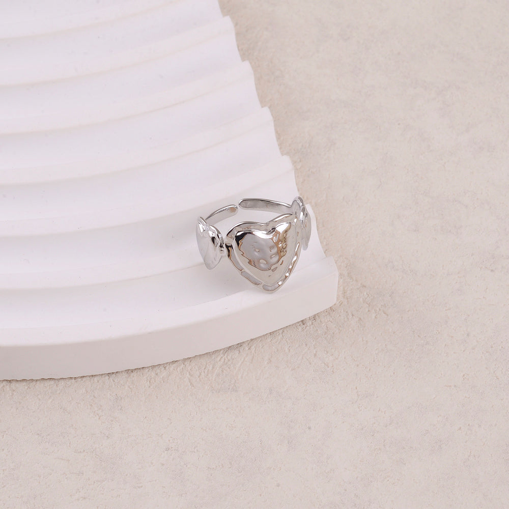 BAGUE AVEC 3 COEURS MARTELES